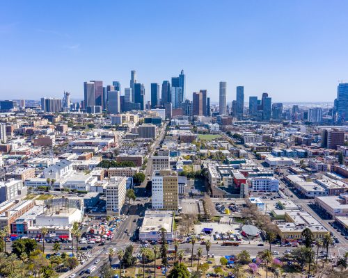 Downtown cityscape of Los Angeles California shows the congested business environment during a bright day.